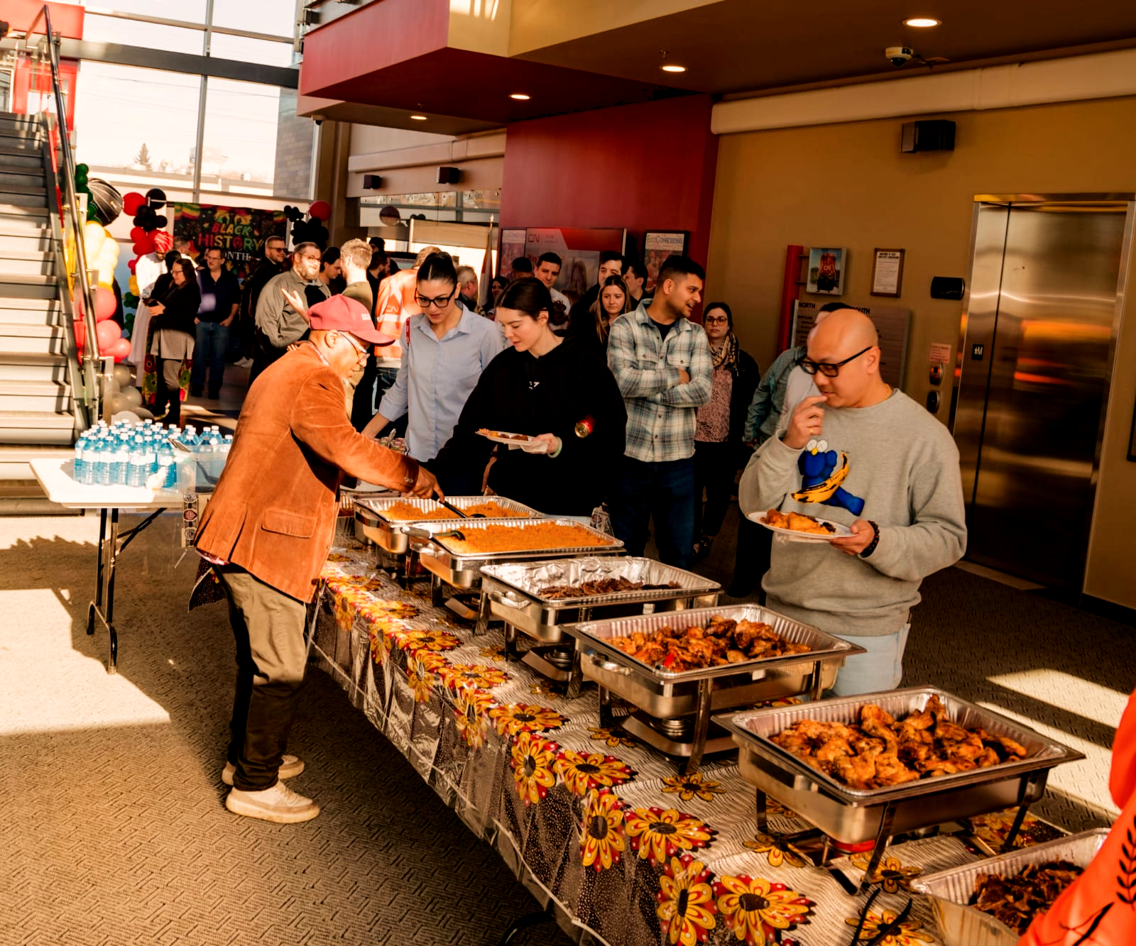 Guests gathering around a Kilimanjaro VIP event buffet